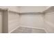 A small closet features ample storage space, with rods and shelving for organization at 14120 Bunny Hop Ln, Parker, CO 80134