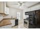 Functional kitchen with modern appliances and ample counter space at 1735 Dayton St, Aurora, CO 80010