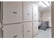Laundry room with storage lockers and updated appliances at 1850 Folsom St # 411, Boulder, CO 80302