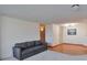 Inviting living room featuring a gray sofa and warm wood flooring at 1850 Folsom St # 411, Boulder, CO 80302
