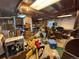 Unfinished basement space filled with boxes and various items at 14874 E 52Nd Ave, Denver, CO 80239