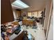 Large kitchen with wood cabinets, laminate flooring, and a large island at 14874 E 52Nd Ave, Denver, CO 80239