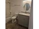 Bathroom featuring a shower-tub combo and vanity with storage space at 7000 W 20Th Ave # 106, Lakewood, CO 80214