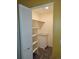 Walk-in closet with built-in shelving and drawers for optimal organization at 7000 W 20Th Ave # 106, Lakewood, CO 80214