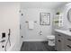 Modern bathroom featuring matte black fixtures, a glass shower, and a minimalist design at 2506 16Th St, Denver, CO 80211