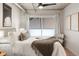 Inviting bedroom featuring a large window and soft textures for a relaxing space at 2506 16Th St, Denver, CO 80211