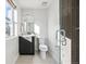 Bathroom with walk-in shower and floating vanity at 4060 W 16Th Ave, Denver, CO 80204