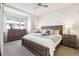 Main bedroom with dresser, nightstands, and large bed at 4060 W 16Th Ave, Denver, CO 80204