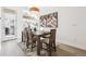 Elegant dining area with a wooden table and access to a patio at 4060 W 16Th Ave, Denver, CO 80204