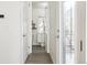 Bright hallway with access to bathroom and balcony at 4060 W 16Th Ave, Denver, CO 80204