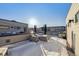 Rooftop deck with covered furniture and snow on the ground at 4060 W 16Th Ave, Denver, CO 80204