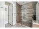 Spacious shower with glass enclosure and modern tile at 4060 W 16Th Ave, Denver, CO 80204