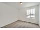 Bright bedroom with carpet flooring and a window with a view at 241 Paloma Way, Elizabeth, CO 80107