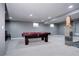 Basement featuring a billiards table with a red cloth at 3889 S Fraser St, Aurora, CO 80014