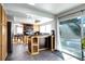 Eat in kitchen boasts granite countertops, stainless steel appliances, and an adjacent dining area at 3889 S Fraser St, Aurora, CO 80014