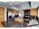 Well-lit kitchen with stainless steel appliances, granite counters, and oak cabinets at 3889 S Fraser St, Aurora, CO 80014
