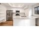 Modern kitchen features stainless steel appliances, granite countertops, and bright lighting at 2685 S Dayton Way # 234, Denver, CO 80231