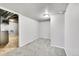 Basement room with gray carpet and white walls, ready for customization and various uses at 7831 Hollywood St, Commerce City, CO 80022