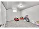 Basement playroom featuring carpet floors, a window for lighting, and room for children to play at 7831 Hollywood St, Commerce City, CO 80022