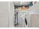 Laundry room with washer, shelving and storage at 10179 S Turkey Creek Rd, Morrison, CO 80465