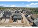 An aerial view of a neighborhood featuring well-maintained homes and spacious driveways at 4581 S Kipling Cir, Denver, CO 80123