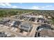 An aerial shot showcases the neighborhood's layout and mountain views in the distance at 4581 S Kipling Cir, Denver, CO 80123