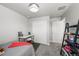 Cozy bedroom with neutral walls, closet with sliding doors, and simple decor creating a serene atmosphere at 4581 S Kipling Cir, Denver, CO 80123