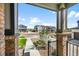 View from the porch of a charming street with similar style homes at 4581 S Kipling Cir, Denver, CO 80123