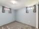 Finished basement room with carpet floors, neutral walls, and natural light from windows at 3531 E 91St Ave, Thornton, CO 80229