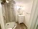 Modern bathroom featuring a tiled shower, vanity, and sleek fixtures at 3531 E 91St Ave, Thornton, CO 80229