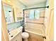 Bathroom features a shower-tub combination and vanity with storage at 3531 E 91St Ave, Thornton, CO 80229