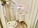 Bathroom with a shower and vanity with storage, a sink, and mirror at 3531 E 91St Ave, Thornton, CO 80229