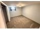 Bedroom with neutral carpeting and natural light from a window at 3531 E 91St Ave, Thornton, CO 80229