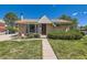 Charming single-story brick home with a well-manicured lawn and a cozy front porch at 3531 E 91St Ave, Thornton, CO 80229