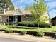 Charming brick home with a well-manicured lawn and a stone retaining wall at 3531 E 91St Ave, Thornton, CO 80229