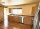 Updated kitchen with stainless steel appliances and wood cabinets at 3531 E 91St Ave, Thornton, CO 80229