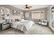 Serene main bedroom featuring modern decor, cozy textures, and large windows with natural light at 3270 S Washington St, Englewood, CO 80113