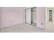 Bright bedroom with a mirrored sliding closet, offering ample storage space and a glimpse into a well-organized interior at 10627 Chautauga Mtn, Littleton, CO 80127