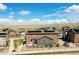 Charming two-story home featuring solar panels, landscaped front yard, and a well-maintained walkway at 8437 Mount Kataka Loop, Littleton, CO 80125
