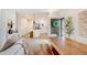 Open living space with a modern kitchen and a comfortable living area with stylish decor at 8437 Mount Kataka Loop, Littleton, CO 80125