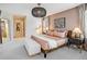 Spacious main bedroom with modern accents, neutral tones, and an inviting atmosphere at 8437 Mount Kataka Loop, Littleton, CO 80125