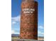 Brick tower sign for Sterling Ranch Colorado under a sunny blue sky at 8437 Mount Kataka Loop, Littleton, CO 80125