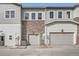 Charming townhome exterior featuring stone accents and neutral siding at 8887 San Antonio St, Littleton, CO 80125