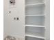 Laundry room featuring shelving and hookups for washer and dryer at 8887 San Antonio St, Littleton, CO 80125