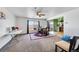 Bright living area with a window view, creating a cozy and inviting atmosphere at 5214 Perth Ct, Denver, CO 80249