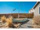 Interesting backyard with desert landscaping and a boat as a focal point at 6812 Indian Paintbrush St, Frederick, CO 80530