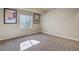 Bright basement room with natural light from window and artwork at 6812 Indian Paintbrush St, Frederick, CO 80530