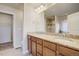 Bathroom boasts dual sinks, granite countertops, and a glass-enclosed shower at 6812 Indian Paintbrush St, Frederick, CO 80530
