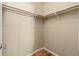 Simple walk-in closet with standard shelving and laminate flooring, ready for organization at 140 Beaver Rd, Idaho Springs, CO 80452