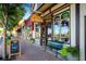 Charming view of 'The Bluegrass' restaurant with vintage design, inviting patrons to enjoy bourbon and coffee at 7017 W 62Nd Pl, Arvada, CO 80003